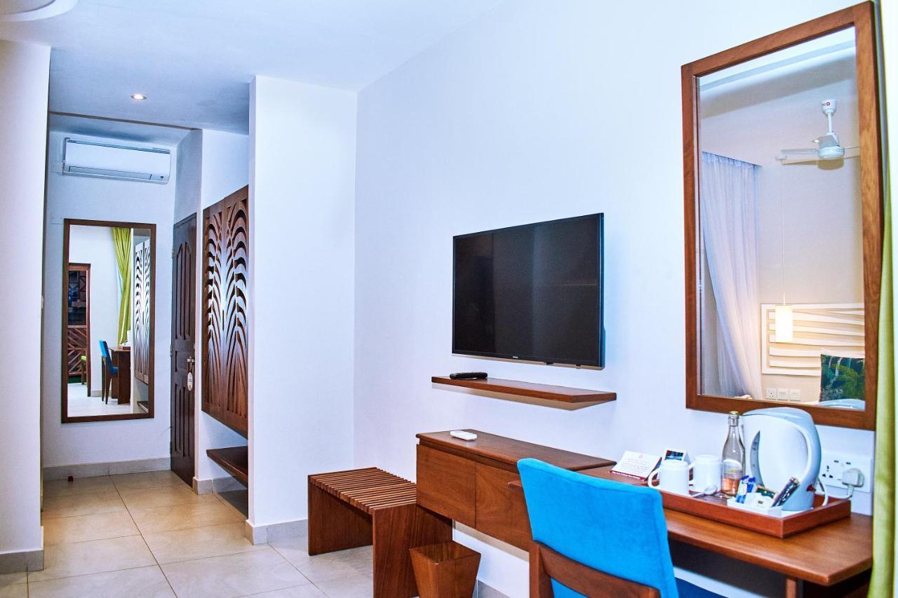Neptune Village Beach Resort & Spa Galu Bagian luar foto