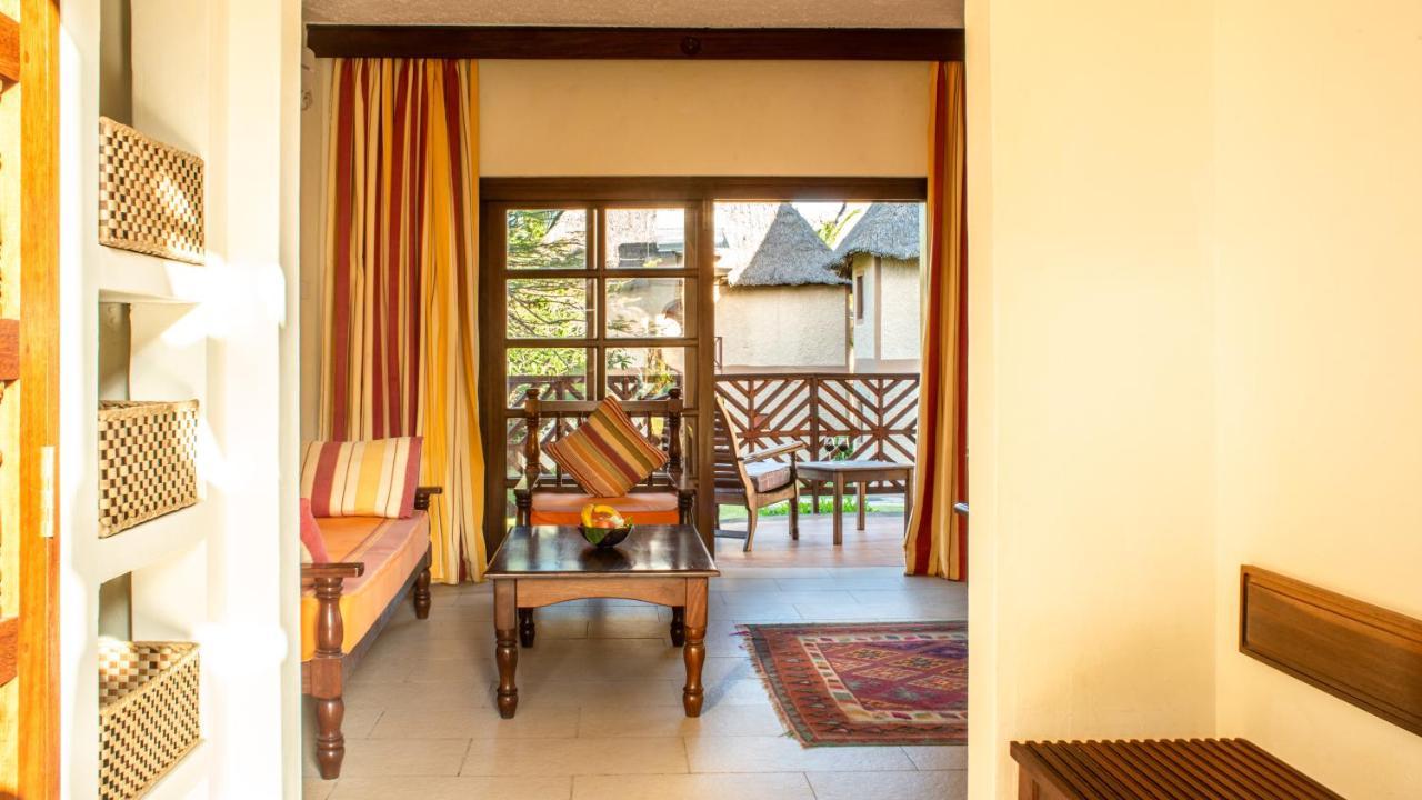 Neptune Village Beach Resort & Spa Galu Bagian luar foto