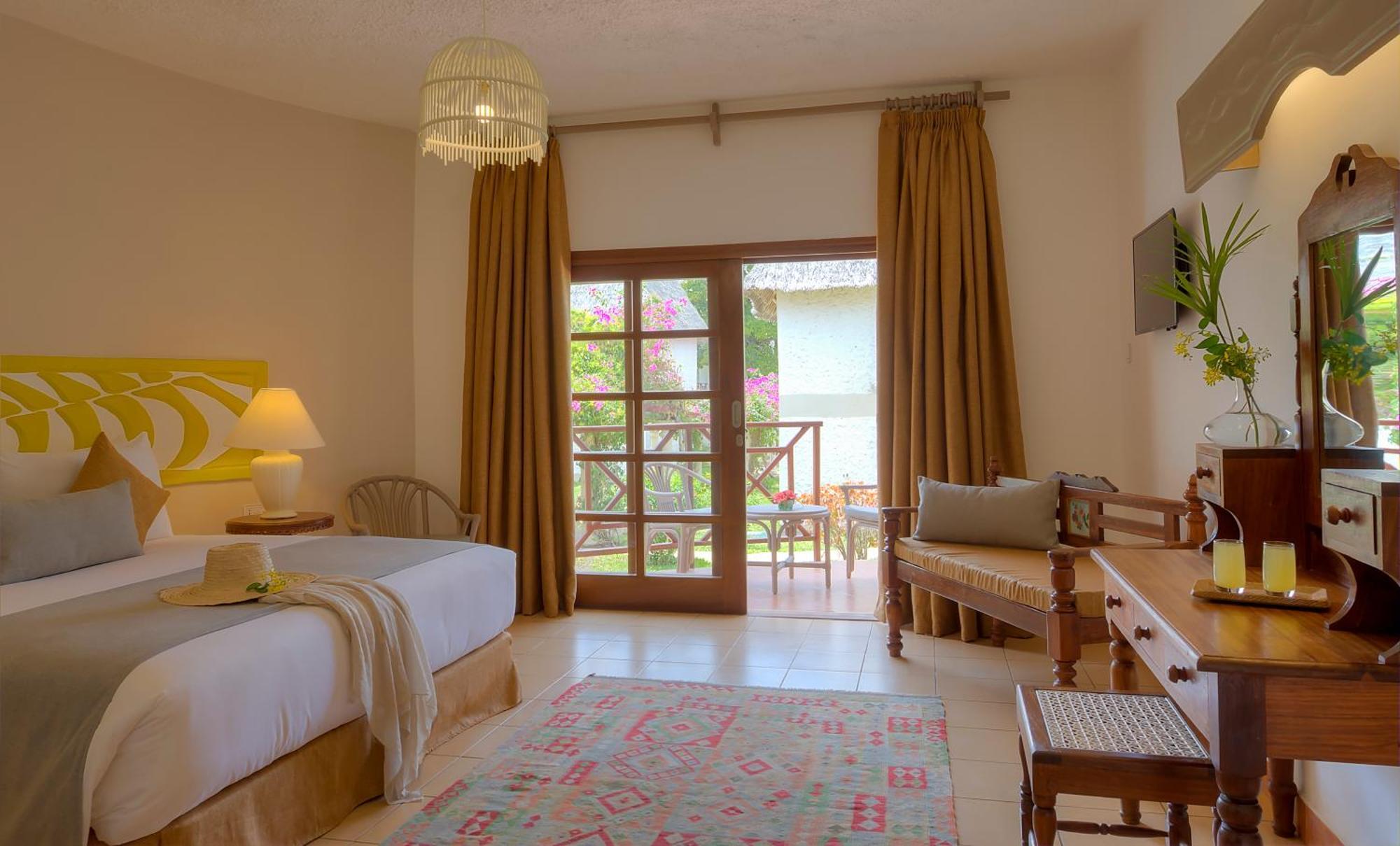 Neptune Village Beach Resort & Spa Galu Bagian luar foto